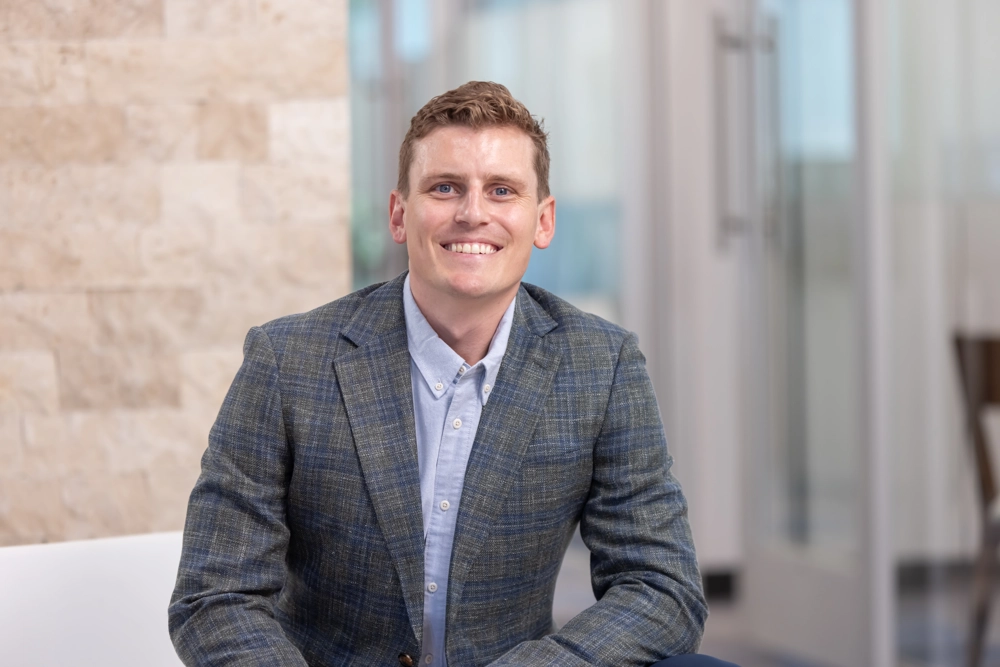 Portrait of a smiling person in professional attire